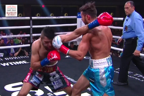 Bryant Perrella conecta uppercut zurdo contra Kevin Salgado